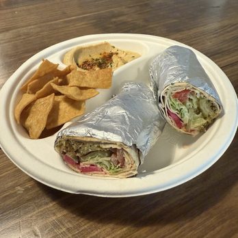 Taste Of Lebanon - Falafel wrap with homemade chips and hummus. - Mediterranean Near Me - Eustis, Florida Taste Of Lebanon - Falafel wrap with homemade chips and hummus. - Mediterranean Near Me - Eustis, Florida