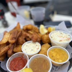 Waldo's - Delicious dolphin fingers Mahi Mahi and coconut shrimp with slaw. . Service is great. Fresh seafood.