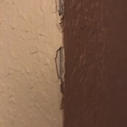 Ashley furniture Store - The wall in my apartment they hit with the sofa.