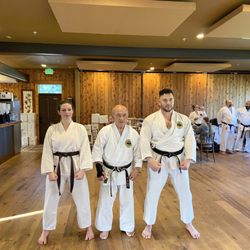White Dragon’s MMA - From left to right: Senpai Delilah, Grandmaster of Shorin Ryu Seibukan Karate Zenpo Shimabukaro, and Sensei Masters, and! It was an honor!