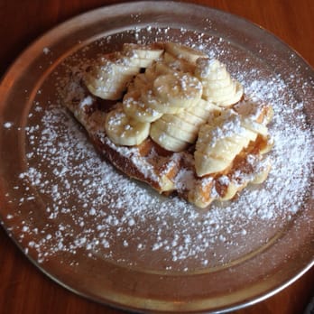 Zinneken's - Harvard Square - Signature waffle with powdered sugar and bananas - Belgian Near Me - Cambridge, Massachusetts Zinneken's - Harvard Square - Signature waffle with powdered sugar and bananas - Belgian Near Me - Cambridge, Massachusetts