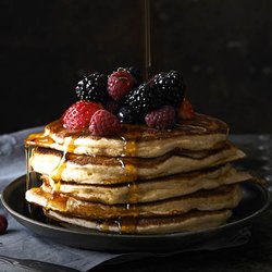 Balans Soho Society - Pancakes with warm maple butter and fruit.