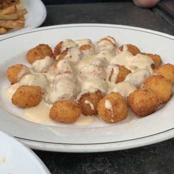 Revolution House - Tater tots with cheese sauce - American Near Me - Philadelphia, Pennsylvania Revolution House - Tater tots with cheese sauce - American Near Me - Philadelphia, Pennsylvania