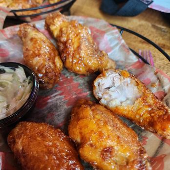 Mad for Chicken - Wings half and half is spicy when they come hot to the table then mellow as they cool down. - Korean Near Me - South Salt Lake, Utah Mad for Chicken - Wings half and half is spicy when they come hot to the table then mellow as they cool down. - Korean Near Me - South Salt Lake, Utah