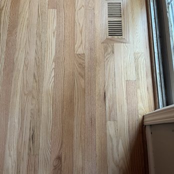 Premier Hardwood Flooring - AFTER - floor by sliding door looks brand new with custom wooden vent to replace the metal vent - Flooring Near Me - Webster, New York Premier Hardwood Flooring - AFTER - floor by sliding door looks brand new with custom wooden vent to replace the metal vent - Flooring Near Me - Webster, New York