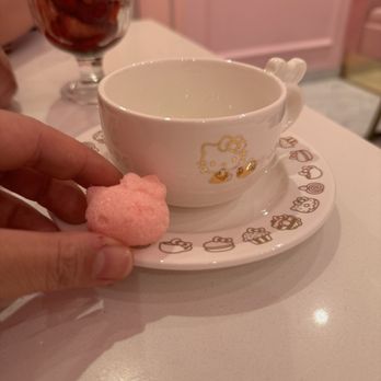Hello Kitty Cafe - Tea Cup with a mini Hello Kitty sugar cube - Cafes Near Me - Irvine, California