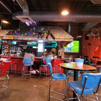 Tin Roof - people sitting at tables in a sports bar - American Near Me - Memphis, Tennessee