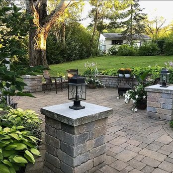 Land Escapes - a brick patio with a fire pit - Landscaping Near Me - Barrington, Illinois