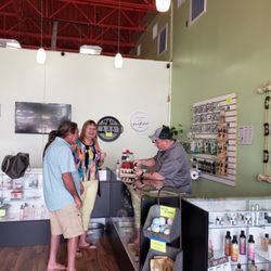Sacred Leaf Humble - Troy helping customers