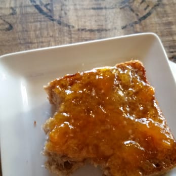 Black Dog Coffeehouse - Oat porridge toast with butter, peach jam and sea salt.
Sorry for the half-eaten nature...my original picture didn't upload. - Coffee & Tea Near Me - Lenexa, Kansas Black Dog Coffeehouse - Oat porridge toast with butter, peach jam and sea salt.
Sorry for the half-eaten nature...my original picture didn't upload. - Coffee & Tea Near Me - Lenexa, Kansas
