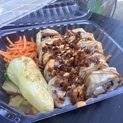 Sushilito Boy - Deep-fried Sushi with shrimp, octopus and bacon crumbles..