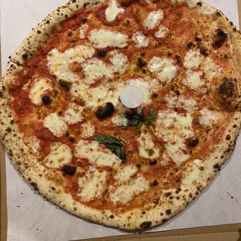 Yard Sale Pizza - Pictured is a "Margherita" pizza with a few puny basil leaves. - Pizza Near Me - London, XGL