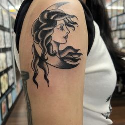Mammoth Tattoo Studio - Tattoo of lady in a moon