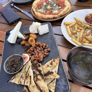 Cara Cara - Charcuterie board..the fries had such a delightful salt. It's not regular but I'm unsure what type it is. - New American Near Me - Los Angeles, California