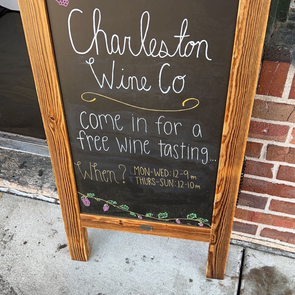 Charleston Wine Co - a chalkboard sign on a sidewalk - Wine Tasting Room Near Me - Charleston, South Carolina Charleston Wine Co - a chalkboard sign on a sidewalk - Wine Tasting Room Near Me - Charleston, South Carolina
