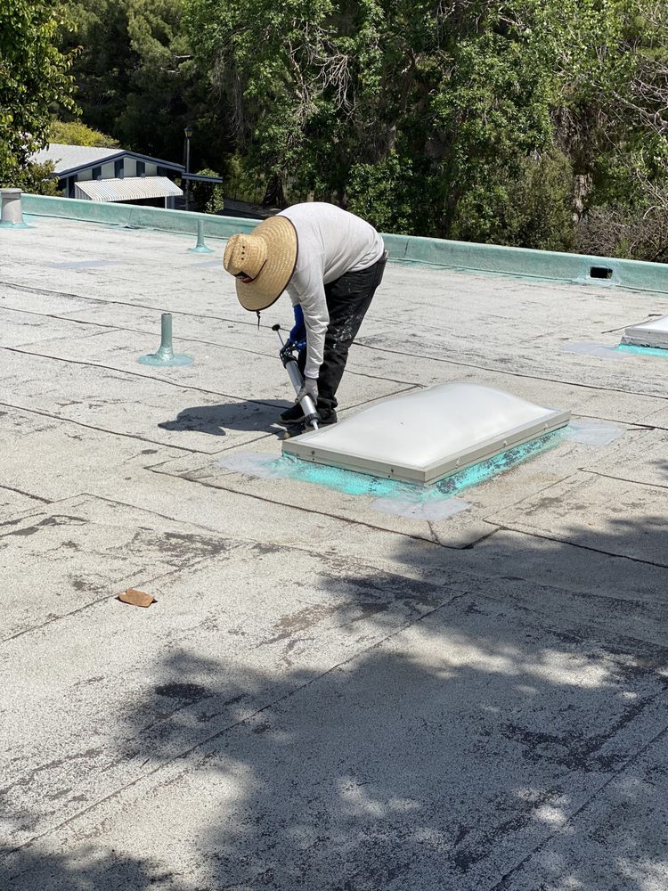 Slide of McGraw and Sons Roofing