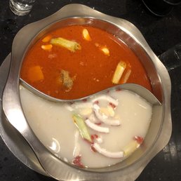 Hot Pot- did half of each broth- coconut & tomato based Hot Pot- did half of each broth- coconut & tomato based