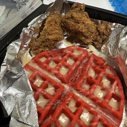 a waffle and fried chicken