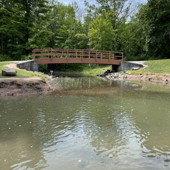 Holley Falls Park - A trail starts here just to the left of this bridge. - Parks Near Me - Holley, New York