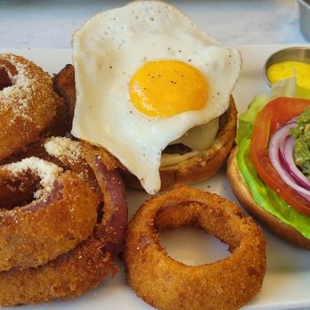 BIN 4 Burger Lounge - The breakfast club with onion rings (extra). The runny yolk and scoop of guac made this very messy to eat. Taste was ok. - Burgers Near Me - Burnaby, British Columbia BIN 4 Burger Lounge - The breakfast club with onion rings (extra). The runny yolk and scoop of guac made this very messy to eat. Taste was ok. - Burgers Near Me - Burnaby, British Columbia
