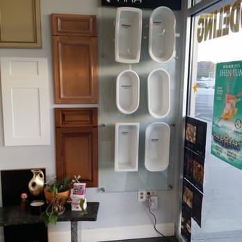 Lay It Straight - a bathroom with urinals on the wall - Cabinetry Near Me - Sharonville, Ohio Lay It Straight - a bathroom with urinals on the wall - Cabinetry Near Me - Sharonville, Ohio