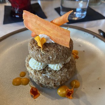 Rue Saint Marc - Carrot cake which is unlike any carrot cake you've ever had it was moist almost more like a bread pudding and a dry cake. - French Near Me - Jacksonville, Florida Rue Saint Marc - Carrot cake which is unlike any carrot cake you've ever had it was moist almost more like a bread pudding and a dry cake. - French Near Me - Jacksonville, Florida
