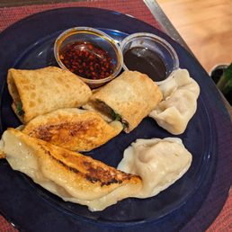 Takeout order - beef rolls, fried pork dumplings, cabbage/shrimp/pork dumplings. Alllll delicious Takeout order - beef rolls, fried pork dumplings, cabbage/shrimp/pork dumplings. Alllll delicious