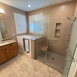 Silverado Construction - Shower, Ella walk-in tub, and some of the counter with sink.