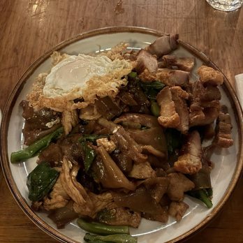 Pai Northern Thai Kitchen - Pad see ew with fried egg and roasted pork - Thai Near Me - Toronto, Ontario