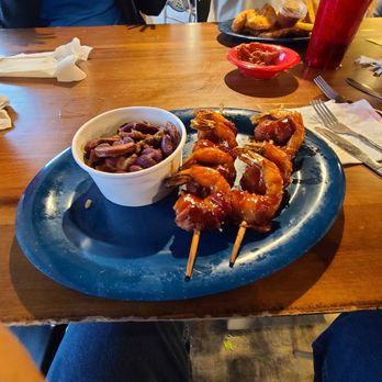 Mango Marley's - Bacon wrapped shrimp with a side order of red beans and rice. It also comes with a side salad. - American Near Me - Mexico Beach, Florida Mango Marley's - Bacon wrapped shrimp with a side order of red beans and rice. It also comes with a side salad. - American Near Me - Mexico Beach, Florida