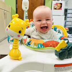 One of our happy infants enjoying playtime at Mimi's Learning Center!