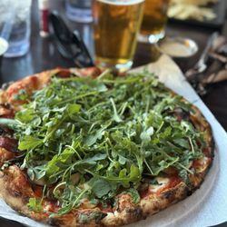 Fired Up Pizzeria - Pepperoni with mushrooms, roasted garlic & arugula