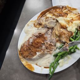 Chicken fried steak under cooked Chicken fried steak under cooked