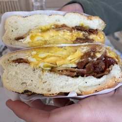 Seaqua Delicatessen and Caterers - Bacon, over easy egg and cheese on a roll