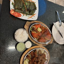 Aroma Indian Cuisine - Top to bottom: Meen Polichattu, Tandoori Chicken, Lamb Boti Kabob