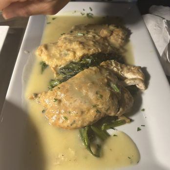 Pino Wine Bar & Bistro - Chicken Milanese over a bed of spinach - Wine Bars Near Me - Lindenhurst, New York Pino Wine Bar & Bistro - Chicken Milanese over a bed of spinach - Wine Bars Near Me - Lindenhurst, New York