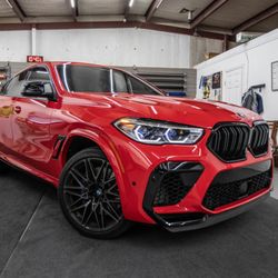 Neck Breaker Vinyl Company - This BMW was previously black. We love the color our customer chose to make their vehicle stand out!