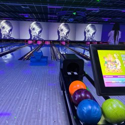Pin Strikes - Stockbridge - Bowling lane with videos playing