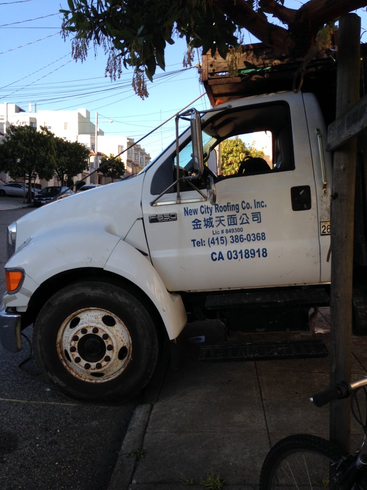 Slide of New City Roofing Co