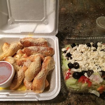 Locri Pizzeria - Breadstix and Greek salad - Pizza Near Me - Davisburg, Michigan Locri Pizzeria - Breadstix and Greek salad - Pizza Near Me - Davisburg, Michigan