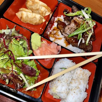 Thai Chef - a bento box of food with chopsticks - Thai Near Me - Schertz, Texas Thai Chef - a bento box of food with chopsticks - Thai Near Me - Schertz, Texas