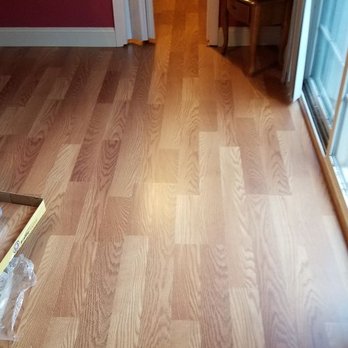 Hank's New Haul - Laminate floor and baseboard installation - Junk Removal & Hauling Near Me