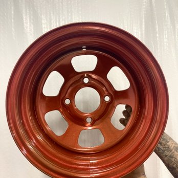 Houston Coatings - Orange powder coated steel wheel - Powder Coating Near Me - Houston, Texas