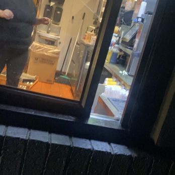 McDonald's - a man standing in front of a window - Fast Food Near Me - Tucson, Arizona McDonald's - a man standing in front of a window - Fast Food Near Me - Tucson, Arizona