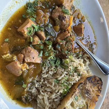 Urban Plates - Moroccan chicken braise with rice pilaf - Salad Near Me - Pasadena, California Urban Plates - Moroccan chicken braise with rice pilaf - Salad Near Me - Pasadena, California
