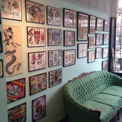 Five Fathoms Tattoo - One of the walls of hand painted custom flash to get you inspired!