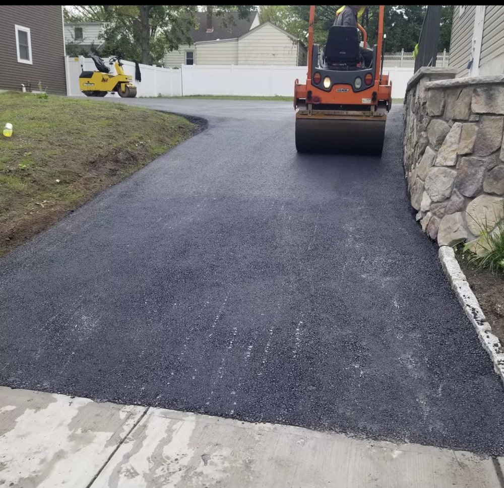 Slide of S&J’s Roofing & Parking Lot Maintenance