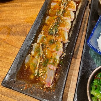 Kiraku - Suzuki Carpaccio (Striped Bass w/ Yuzu Citrus, Chive & Ginger) - Tapas/Small Plates Near Me - Berkeley, California Kiraku - Suzuki Carpaccio (Striped Bass w/ Yuzu Citrus, Chive & Ginger) - Tapas/Small Plates Near Me - Berkeley, California