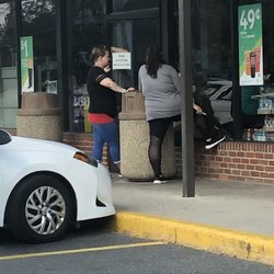 7-Eleven - Rude woman in black and red who works there