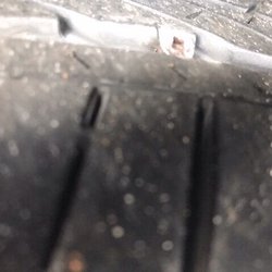 Schumacher Automotive Body Shop - This is the nail that the so called technicians said they were pebbles stuck together?......